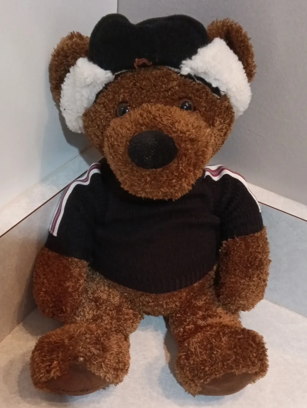 Eddie Bauer Brown Plush Bear Footpad with Black Embroidered Logo